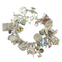 Mid 20th century silver charm bracelet, suspending various charms