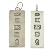 Two silver ingot pendants