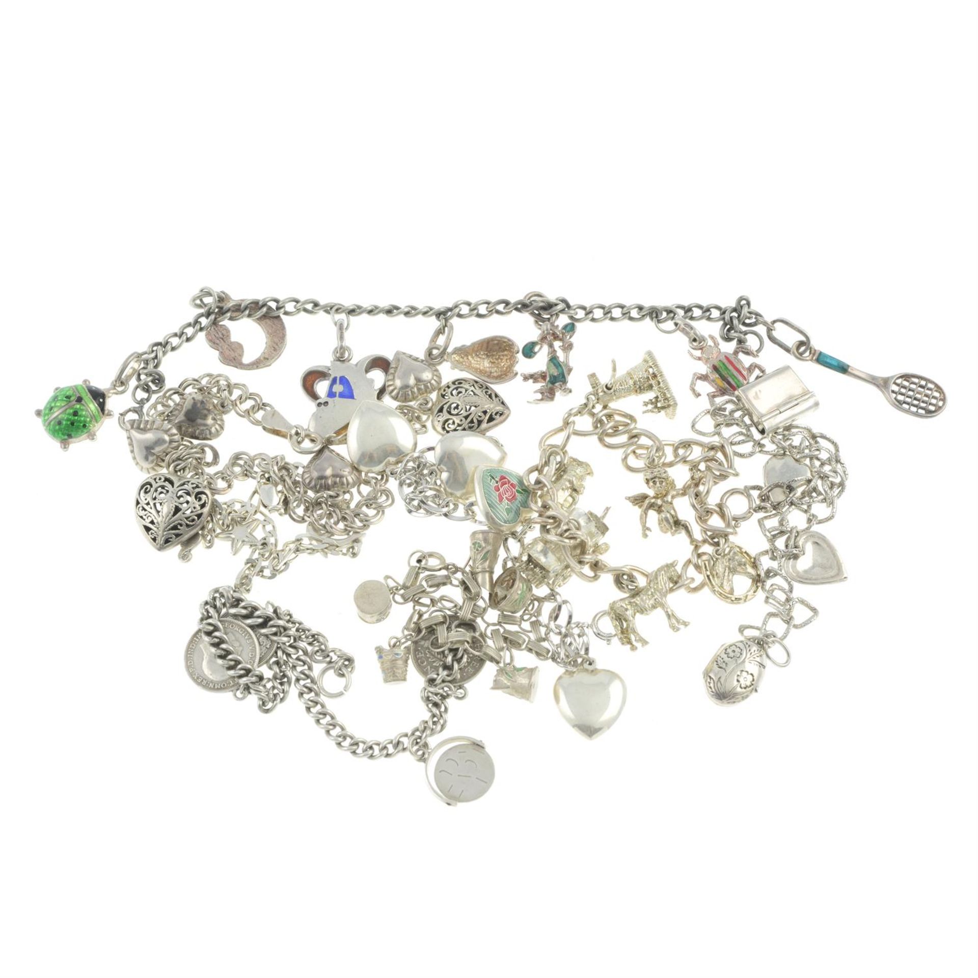 Eight silver charm bracelets