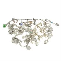 Eight silver charm bracelets