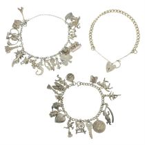 Two charm bracelets and a silver bracelet