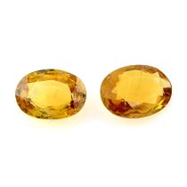 Two oval-shape orange sapphires, 4.93ct