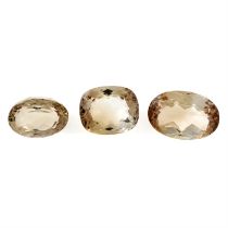 Three vari-shape brown topazes, 43.07ct