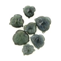 Assorted carved green sapphires, 18.44ct
