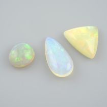 Three vari-shape opal cabochons, 44.26ct