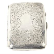 Silver cigarette case; plus a silver mounted glass scent bottle & a plated horseshoe vesta. (3).