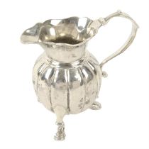 George II silver cream jug.