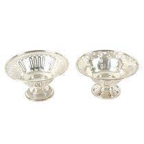 Two George V silver bonbon dishes; plus four napkin rings & a pair of American silver mounted dwarf