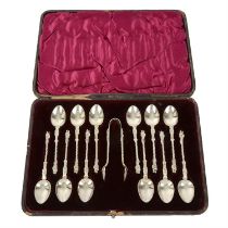 Cased late Victorian silver set of Apostle-top spoons & sugar tongs.