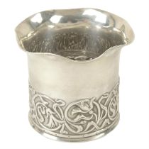 Turn of the century small silver pot.