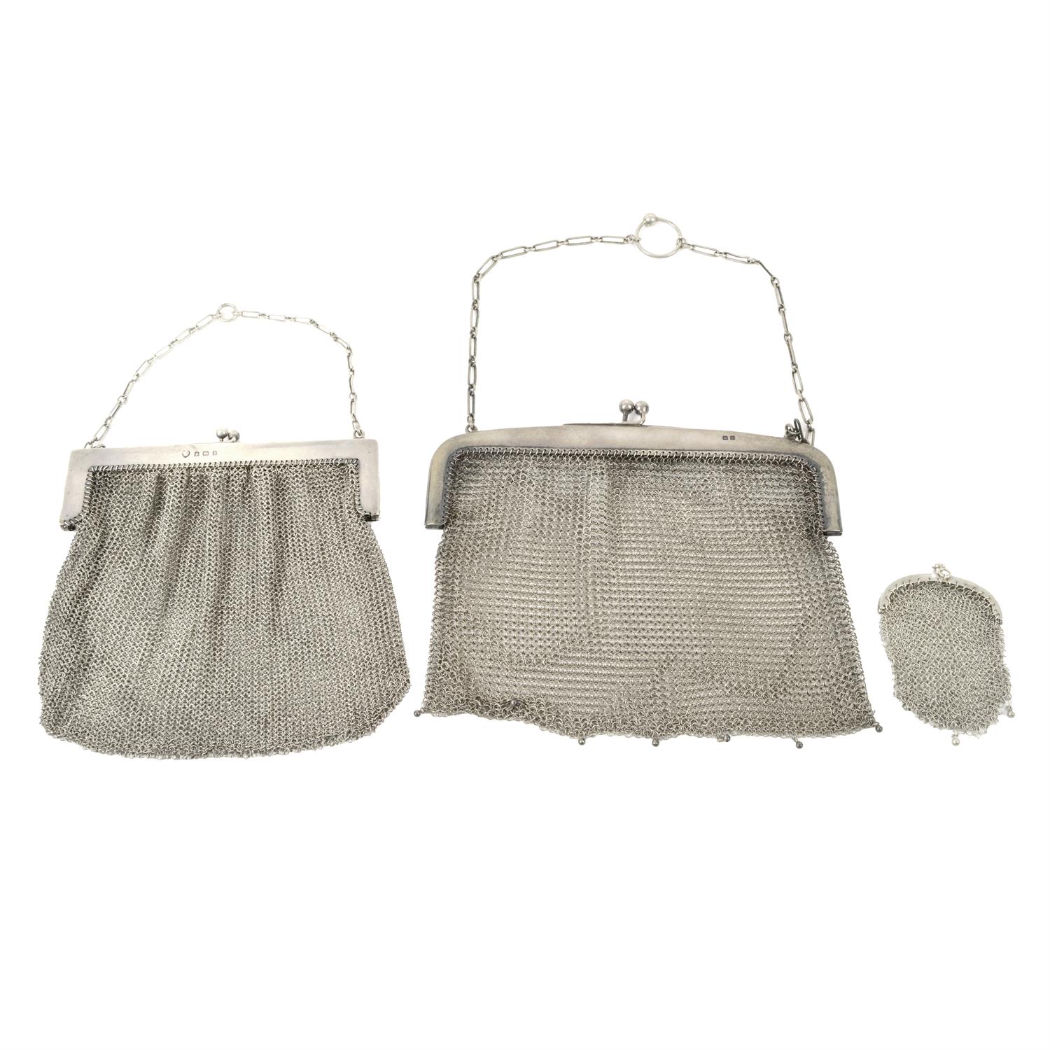 Two George V silver mounted mesh bags; plus a base metal coin purse. (3).