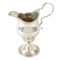 George III silver pedestal cream jug.