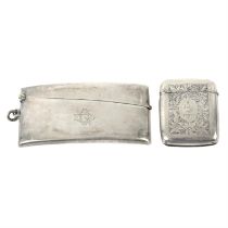 Late Victorian silver vesta case; plus a 1920's silver visiting card case. (2).
