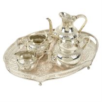 Silver plated four piece tea service; plus a large gallery rim.