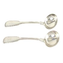 Pair of George IV silver sauce ladles.