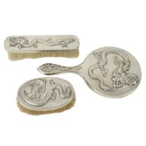 Chinese export silver dragon motif dressing table set.