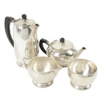 Mid-20th century Arts & Crafts four piece silver tea set by Frederick Newland Smith.