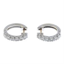 Pave-set diamond hoop earrings