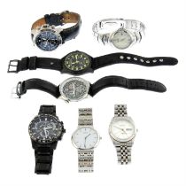 A group of seven Citizen watches.
