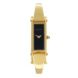 Gucci - a 1500L bangle watch, 12x30mm.