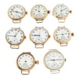 A group of eight trench style watch heads.