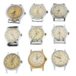 A group of nine Oris watch heads.