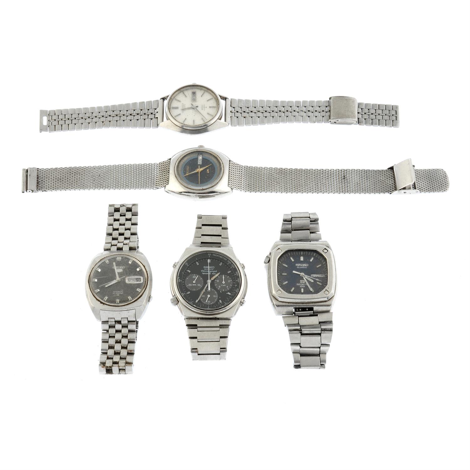 A group of five Seiko watches.