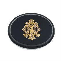 Early 20th gold onyx & split pearl mourning brooch