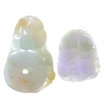 Two carved jadeite pendants