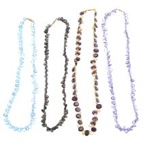Four gem-set single-strand necklaces