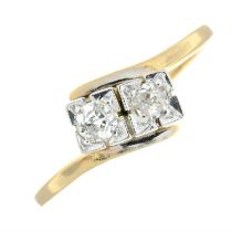 Diamond two-stone crossover ring