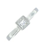 A platinum square-shape diamond single-stone ring.