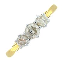 An 18ct gold brilliant-cut diamond three-stone ring.