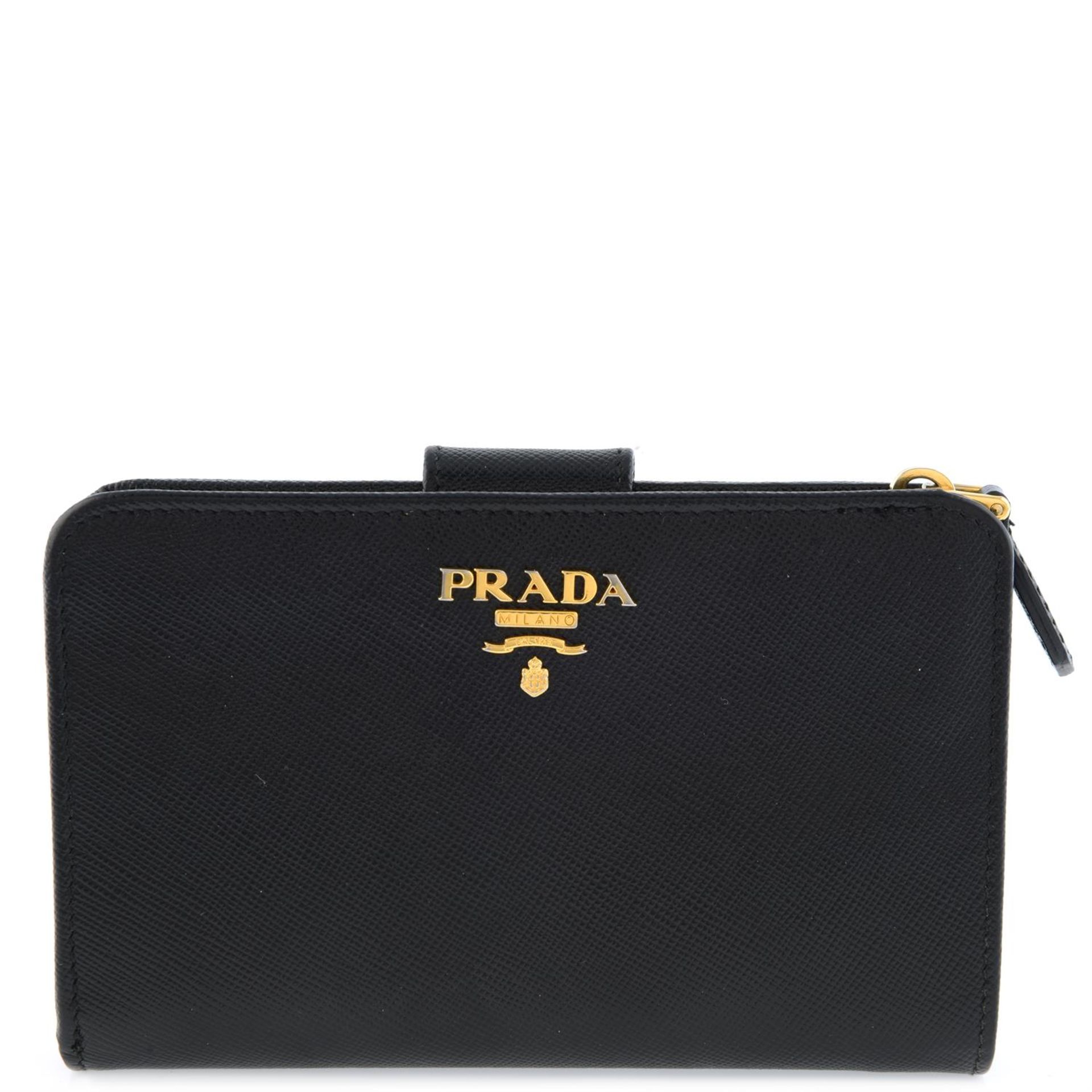 Prada - Saffiano wallet.