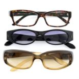 Gucci - two pairs of sunglasses and prescription glasses.