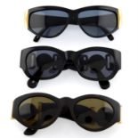 Versace - three pairs of sunglasses.