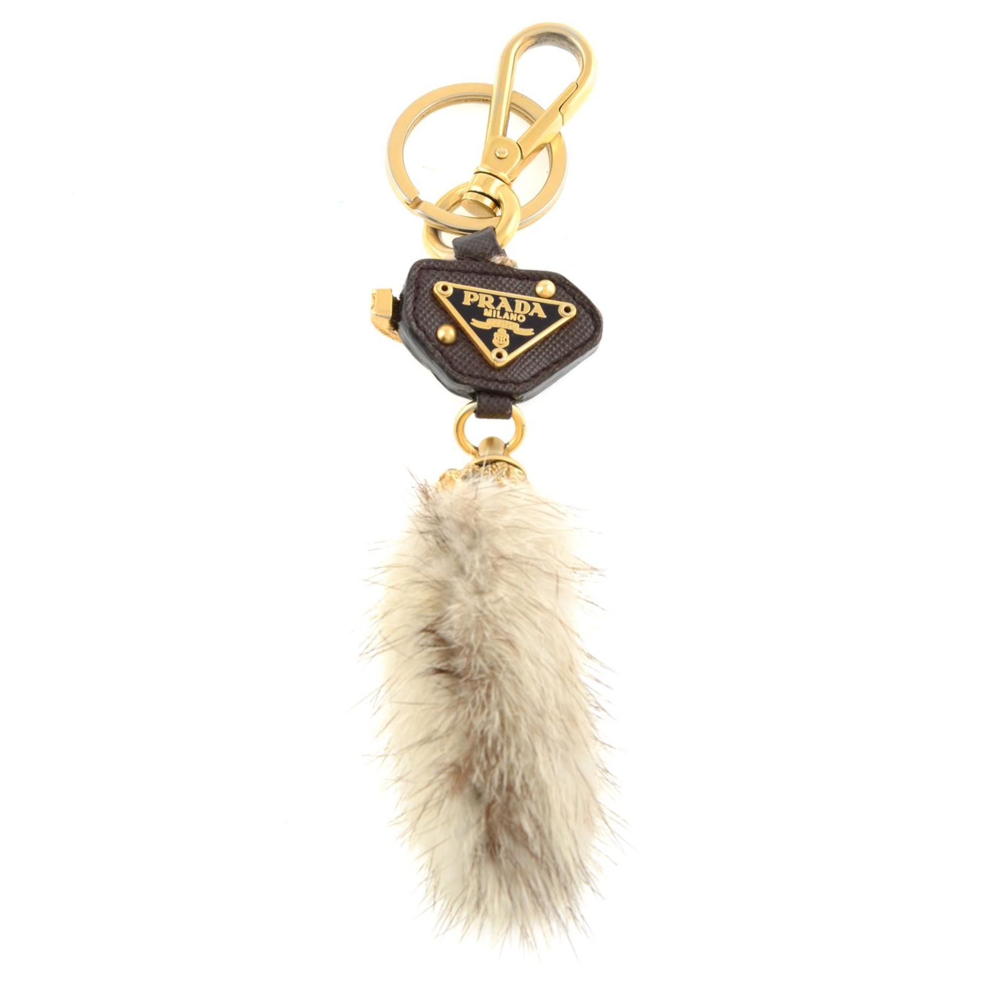 Prada - fur bag charm.