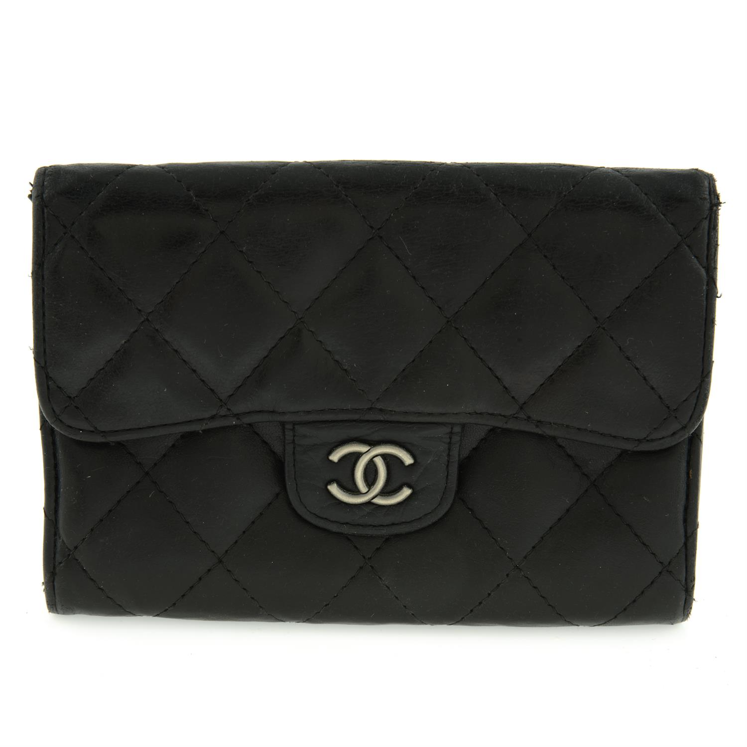 Chanel - CC quilted Flap wallet.