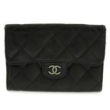 Chanel - CC quilted Flap wallet.