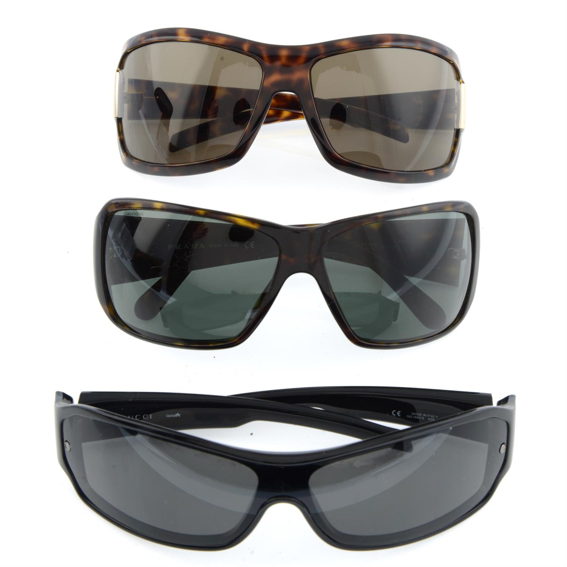 Collection of designers - three pairs of sunglasses.