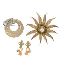 Collection of mixed designers - two brooches and a pair of clip-on earrings.