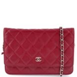 Chanel - quilted CC wallet on chain.