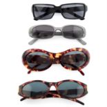 Gucci - four pairs of sunglasses.