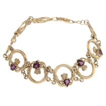 9ct gold garnet Claddagh link bracelet