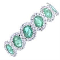 18ct gold emerald & diamodn dress ring