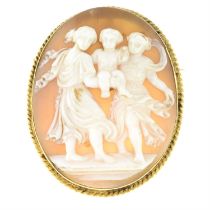 Shell cameo brooch / pendant, depicting two women and a child.