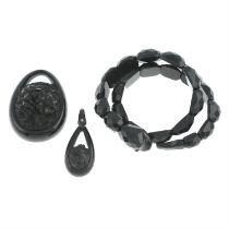 Two jet pendants & a bracelet