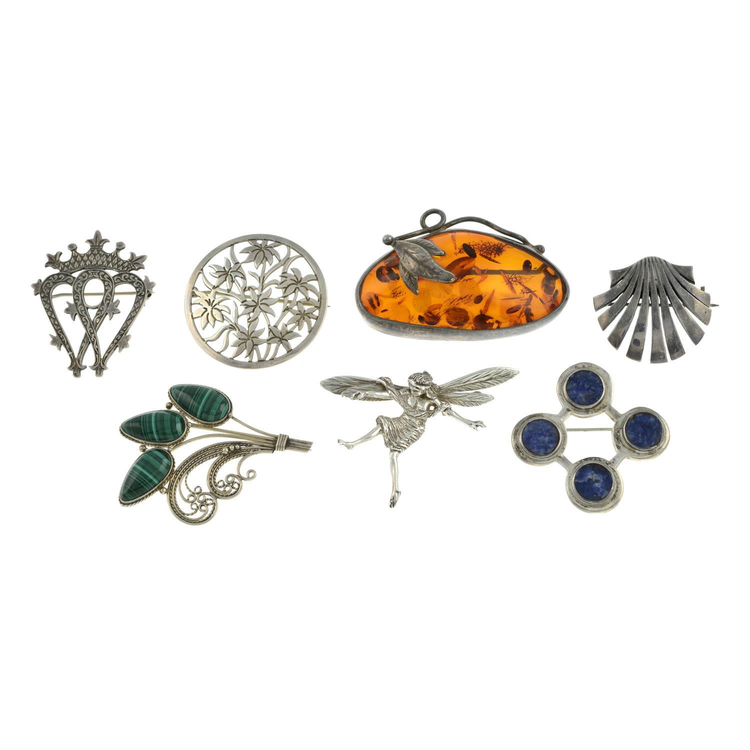 Seven gem-set brooches