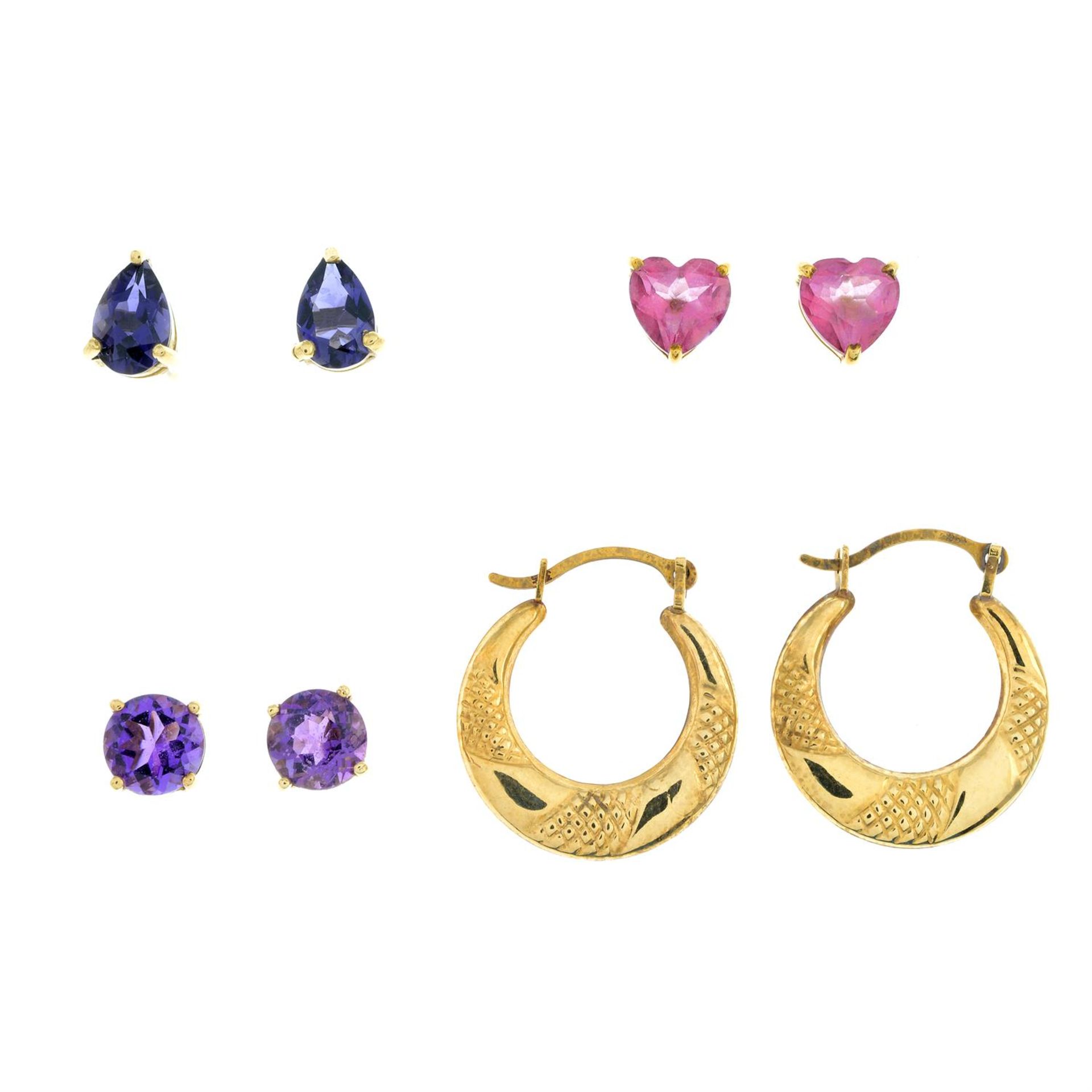 Four pairs of earrings.