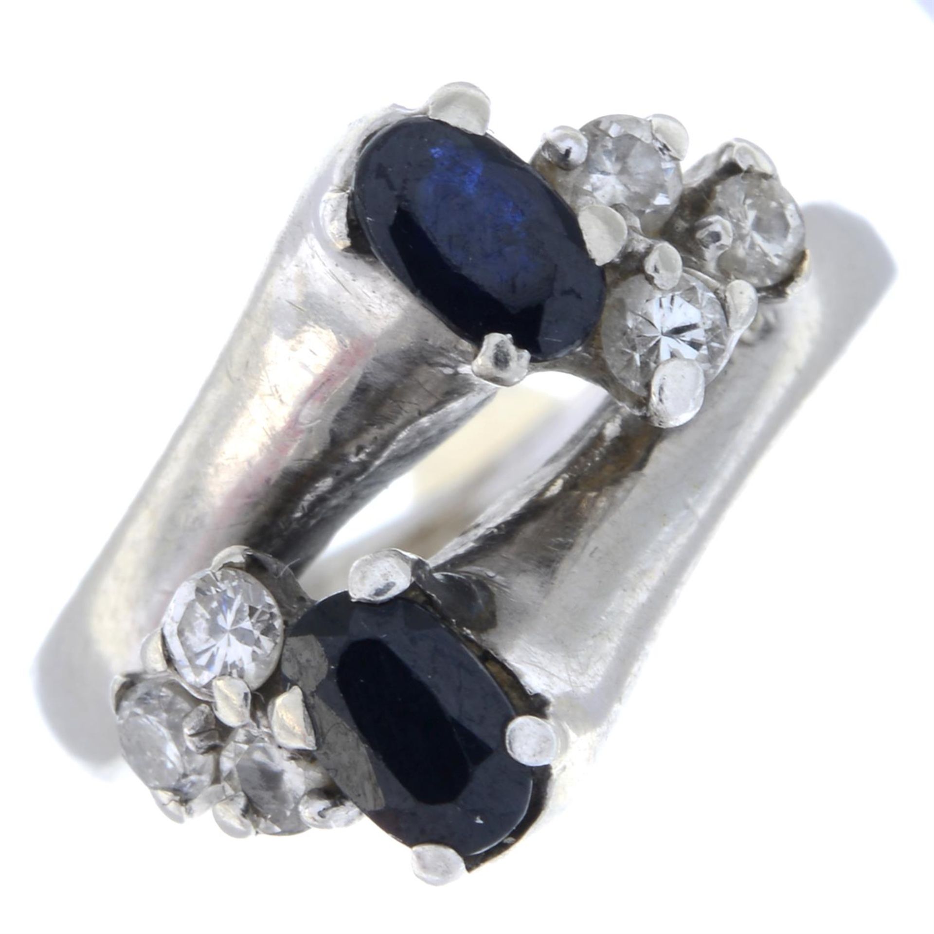 Sapphire & diamond crossover ring